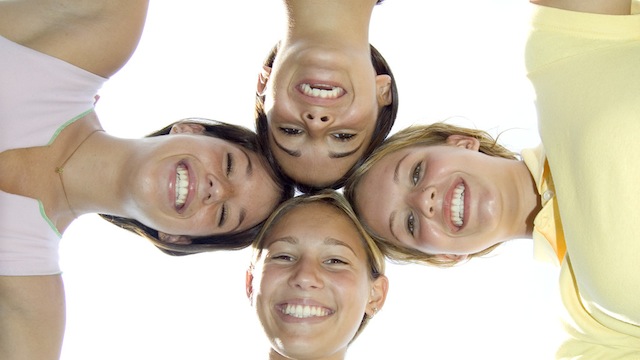 Girls with Heads Together Hugging